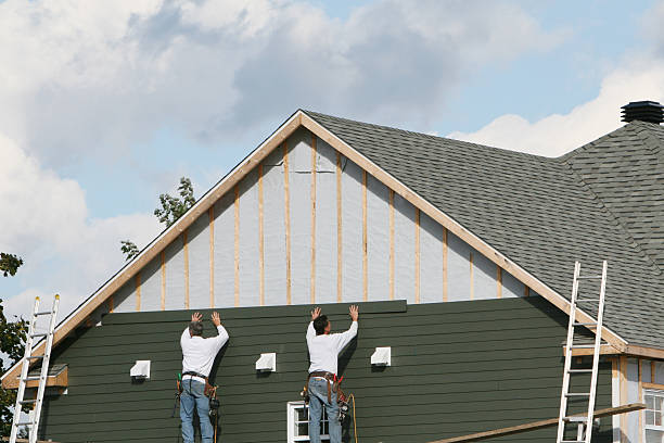 Professional Siding technician working in Providence, NC